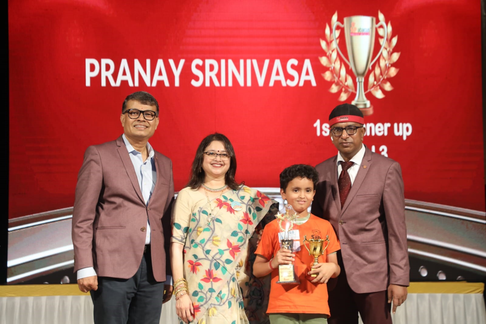 Student with medal or taking exam