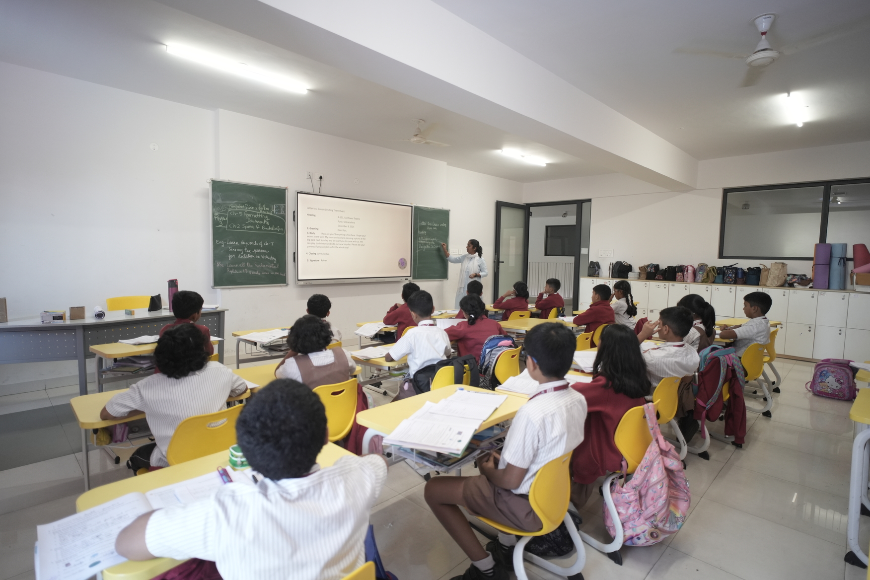 Teacher helping student